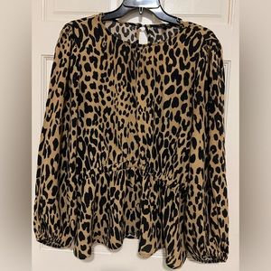 Banana Republic Women’s Leopard Print Peplum Blouse in a size L.